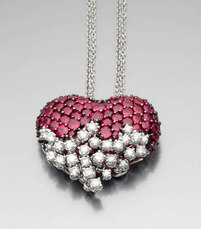 DAMIANI Pendentif en or gris stylisé d'un cœur entièrement serti