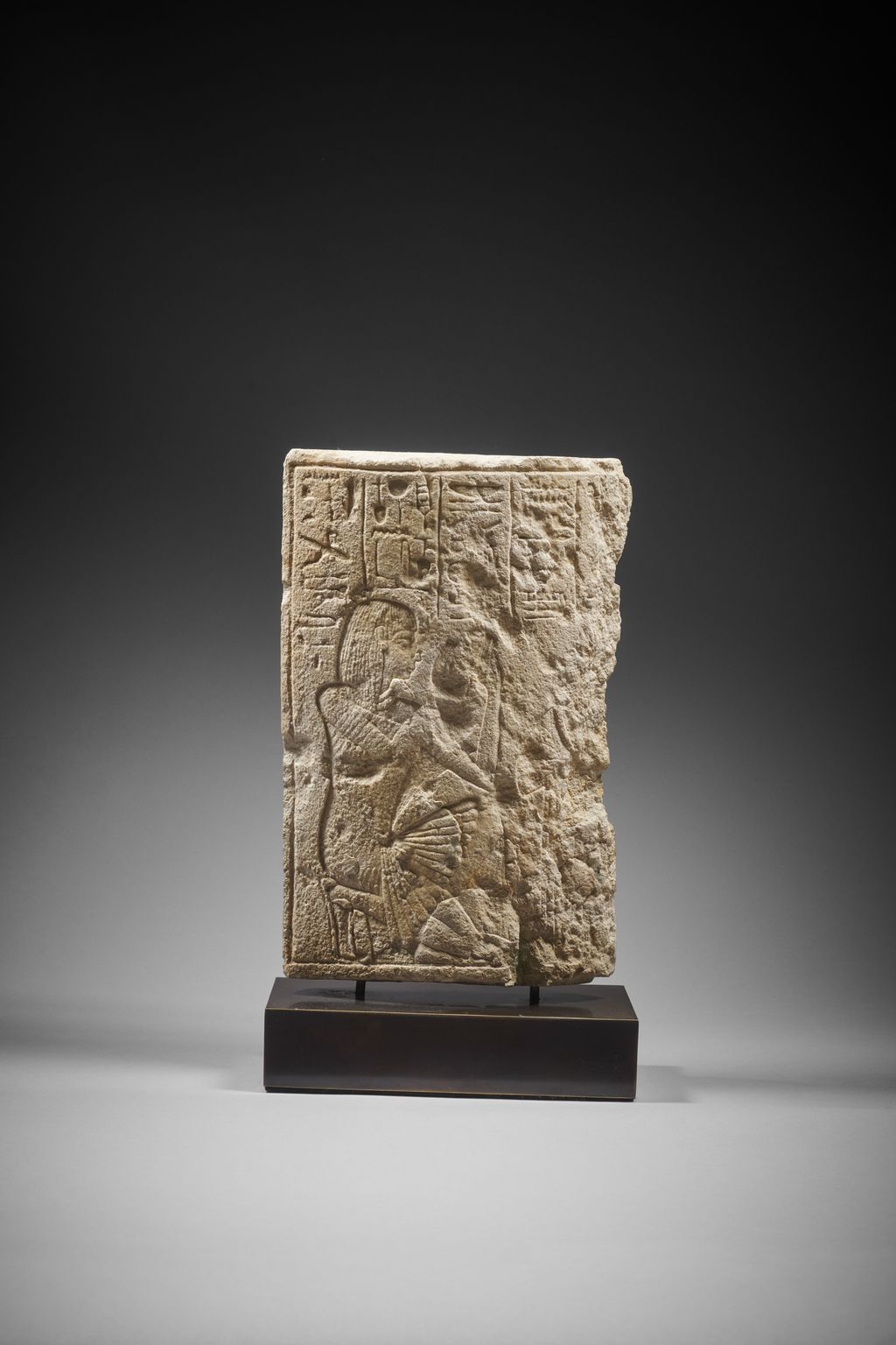 An Egyptian fragmentary limestone relief,